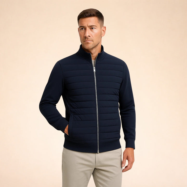 Evan men's warm quilted jacket, a versatile hybrid with stretch knit sleeves for optimal comfort and style.