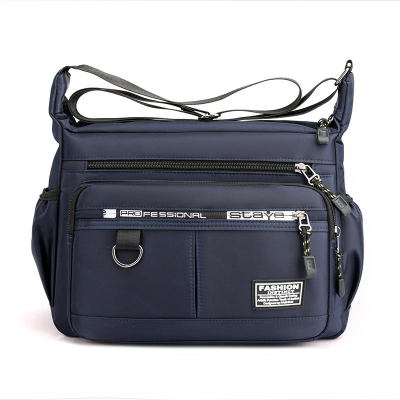 Men's everyday messenger bag with multiple pockets for daily carry, durable and versatile.
