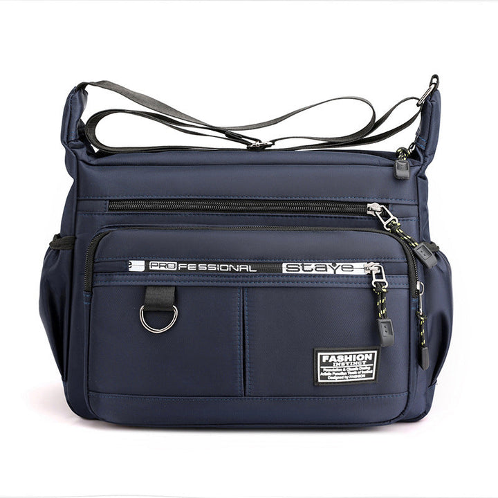 Men's everyday messenger bag with multiple pockets for daily carry, durable and versatile.
