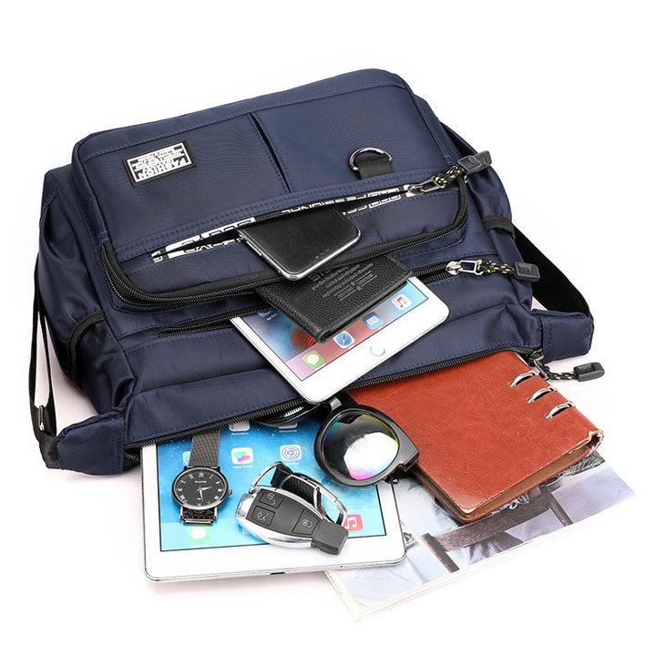 Multi-pocket men's messenger bag, perfect for organizing daily essentials, durable design.