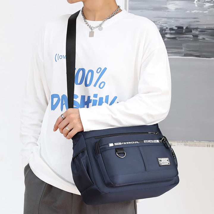 Back view of men's crossbody bag with adjustable strap, comfortable for daily carry.