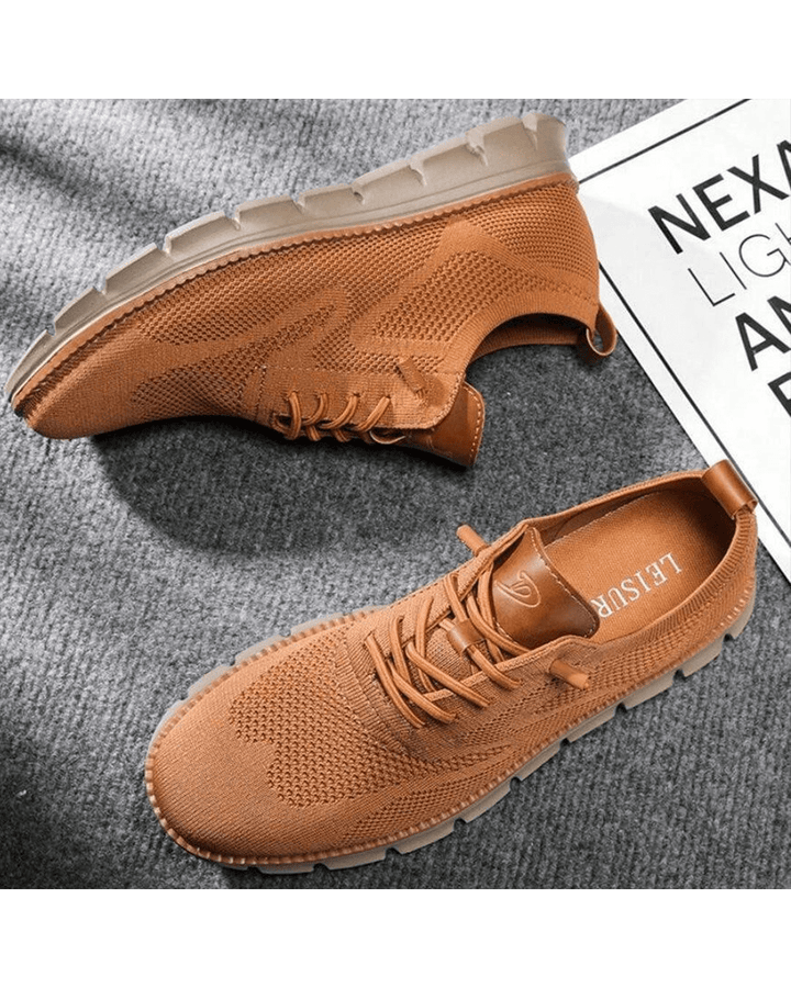 Men's everyday trainers with modern design, combining comfort & style.
