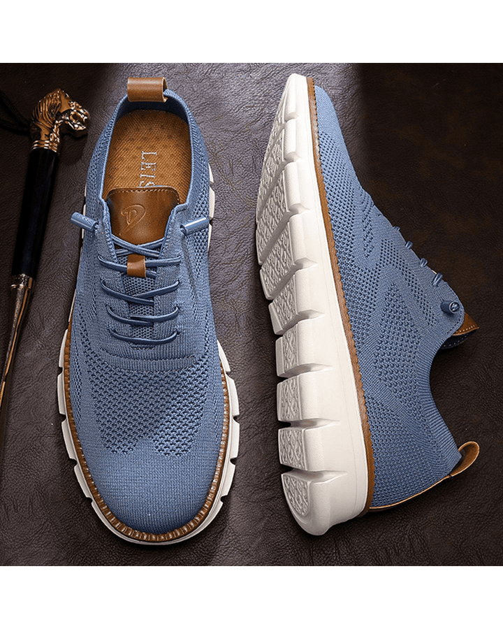 Modern men's everyday sneakers, comfort footwear, versatile for any outfit.