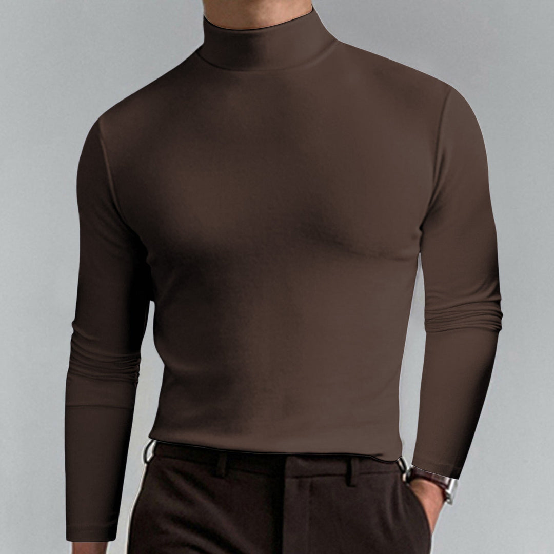 Model wearing a men's smart casual turtleneck sweater for a relaxed look.