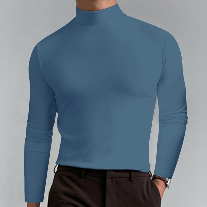 Men's long sleeve turtleneck sweater, ideal for layering in winter fashion.