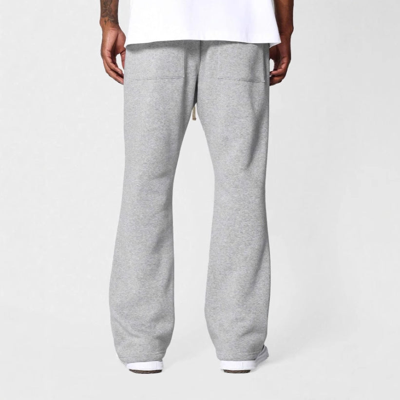 Soft men's flared sweatpants with a relaxed fit for ultimate comfort. Ideal for stylish loungewear and everyday casual wear.
