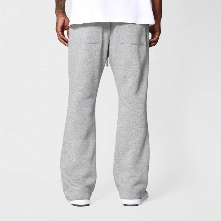 Soft men's flared sweatpants with a relaxed fit for ultimate comfort. Ideal for stylish loungewear and everyday casual wear.