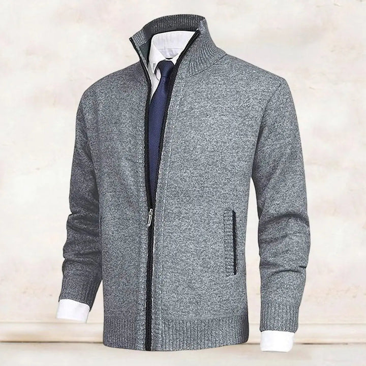 Warm winter men's knit cardigan. Zip-up style with stand collar & soft fleece lining for comfort.