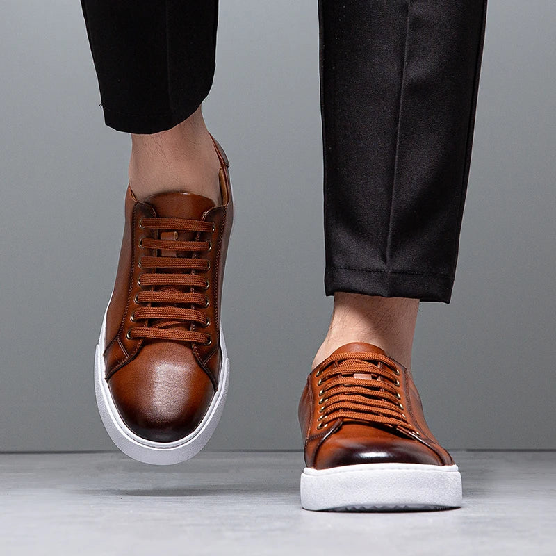 Men's fashion trainers, sleek low-top design for smart casual style.