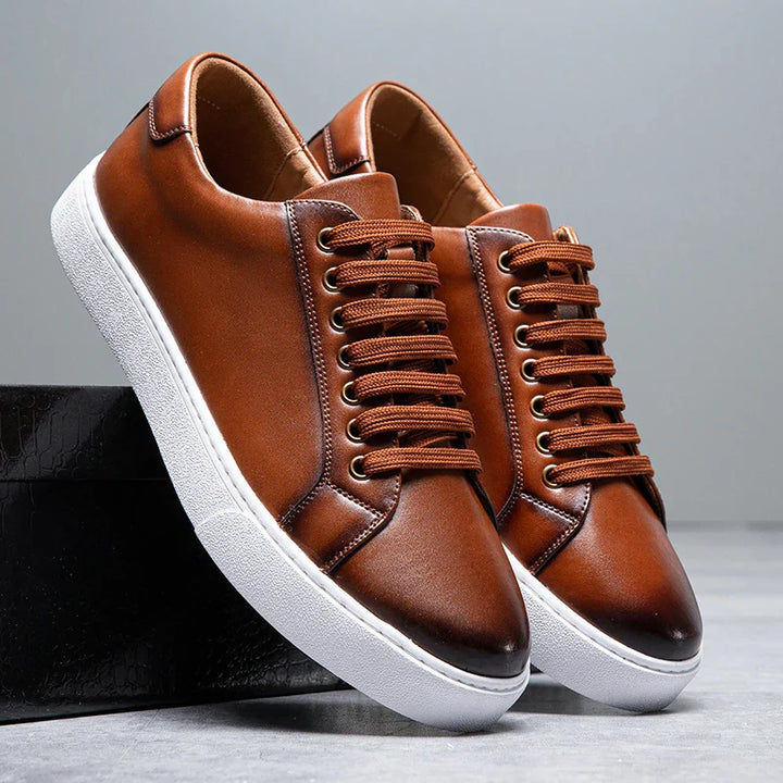 Lace-up men's formal trainers, offering smart casual versatility.