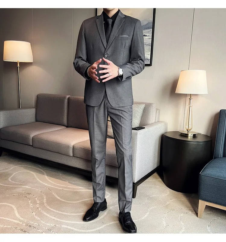 Classic men's formal suit with vest and notch lapel, great for business wear.