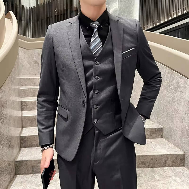 Premium men's formal attire, three-piece suit, notch lapel, for elegant events.