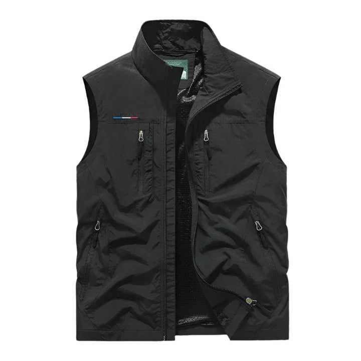 Lightweight men's sleeveless jacket, full zip, ideal for outdoor activities & travel.