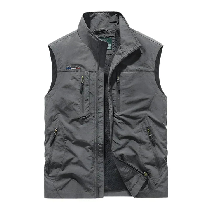 Casual men's travel vest with full zip, a versatile layering piece for all seasons.