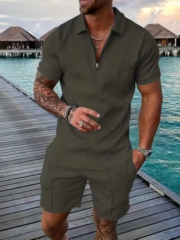 Stylish men's geometric summer outfit with polo shirt and matching shorts, perfect for vacations.