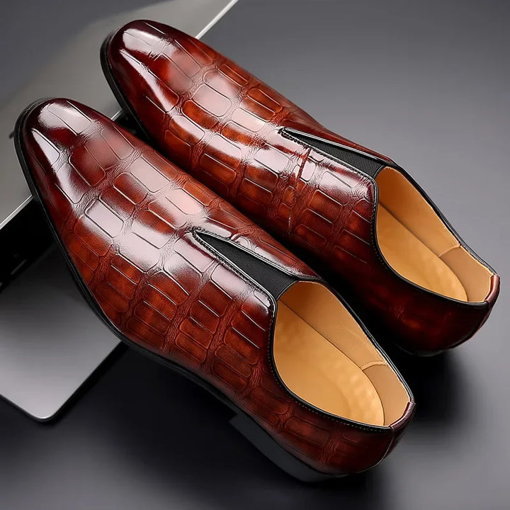 Stylish men's formal slip-on brogue shoes, ideal for business and special occasions.