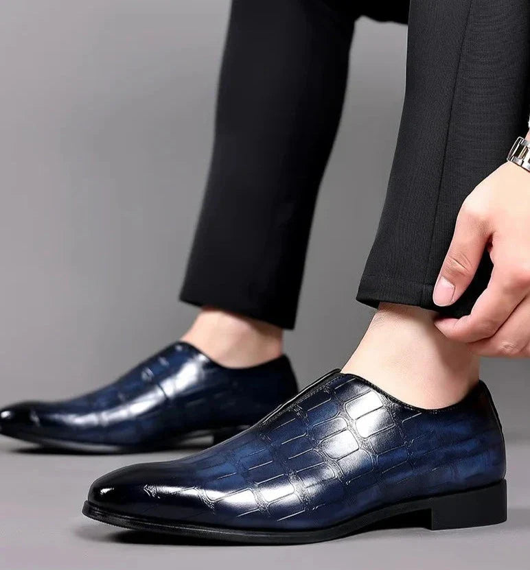 Sophisticated men's brogue shoes, easy slip-on, with a luxurious glossy crocodile pattern.