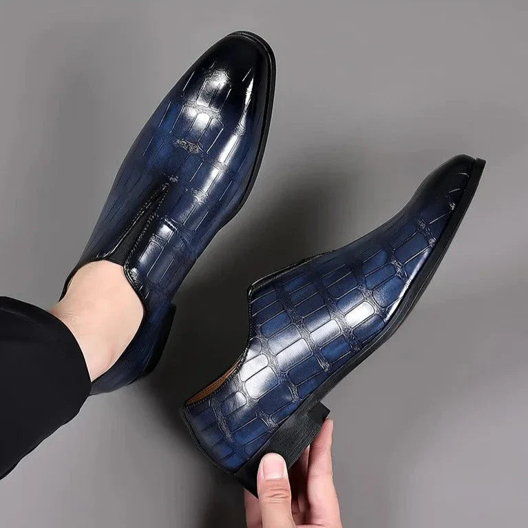 Modern men's glossy crocodile pattern slip-on brogues; comfortable formal dress shoes.