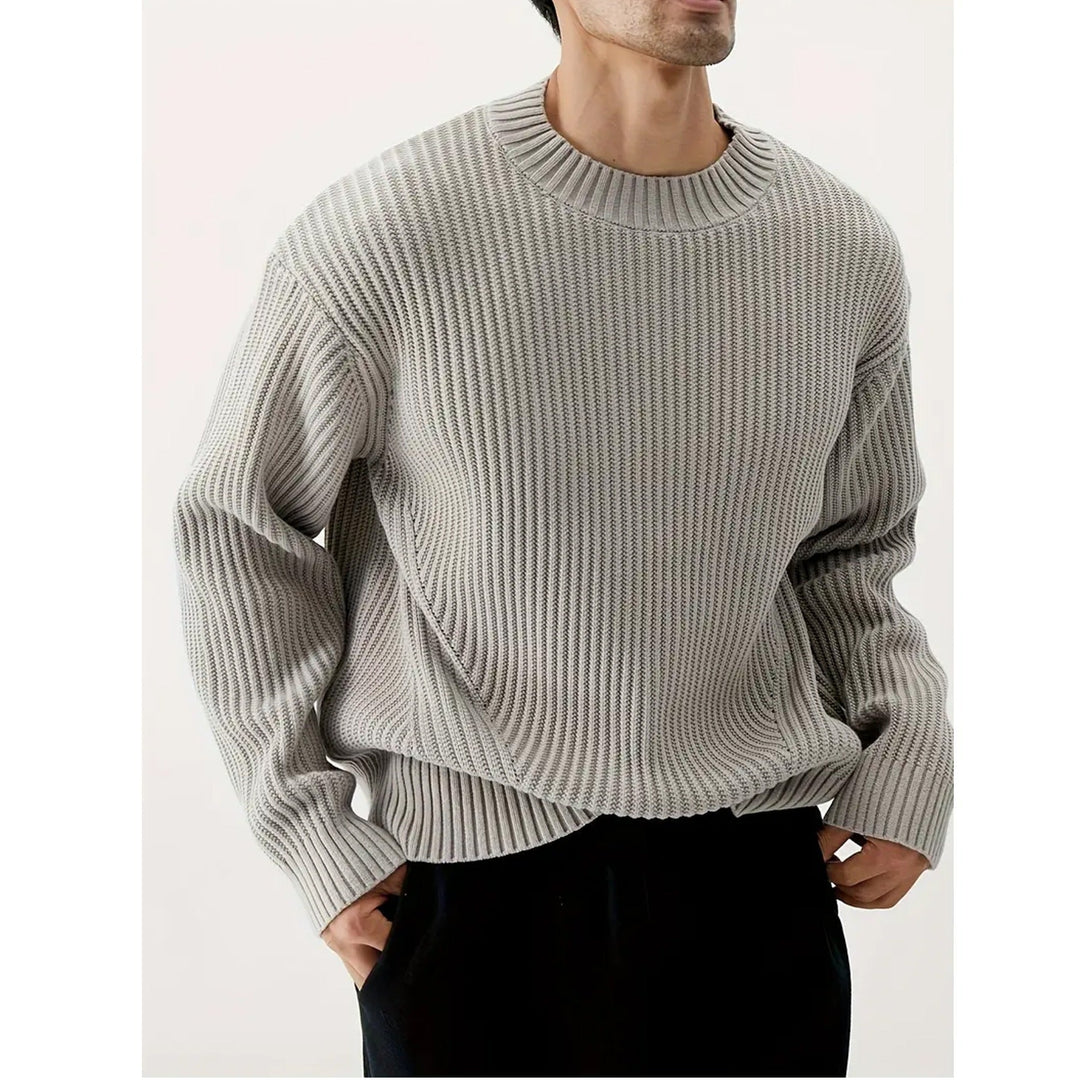 Comfortable men's long sleeve grey crewneck sweater for relaxed casual wear. Soft winter fashion.