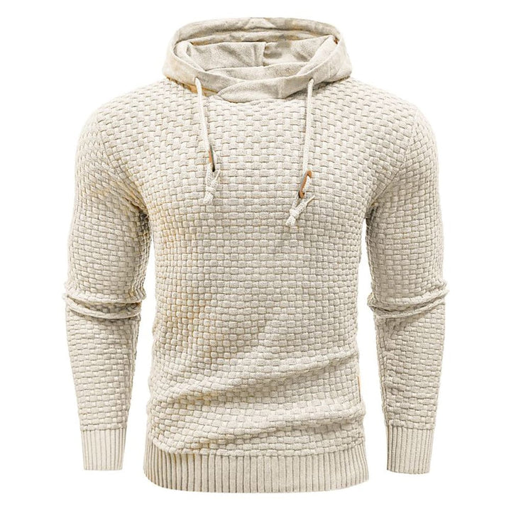Black men's textured pullover hoodie, casual top with drawstring hood for modern layering.
