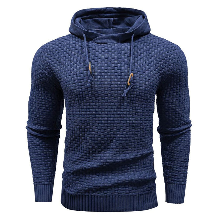 Stylish men's textured hoodie. Pullover design with long sleeves for casual streetwear.