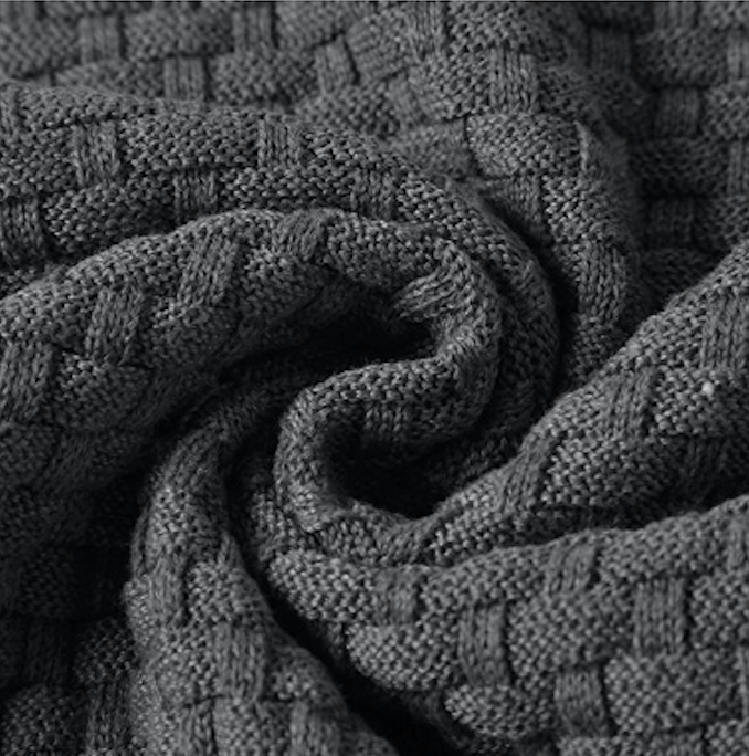 Men's comfortable textured pullover hoodie with adjustable drawstring, perfect for layering.