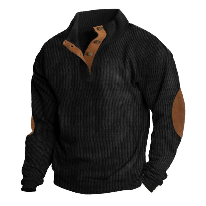 Stylish men's long sleeve half-button pullover sweater. Comfortable knit with classic elbow patches for a refined look.