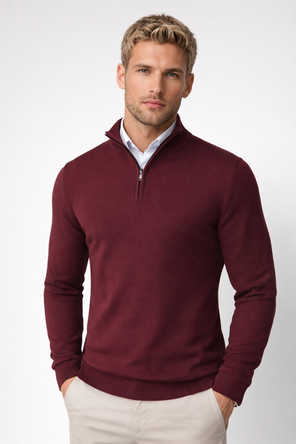 Man wearing a warm half zip high neck sweater, great for casual outings & everyday comfort.