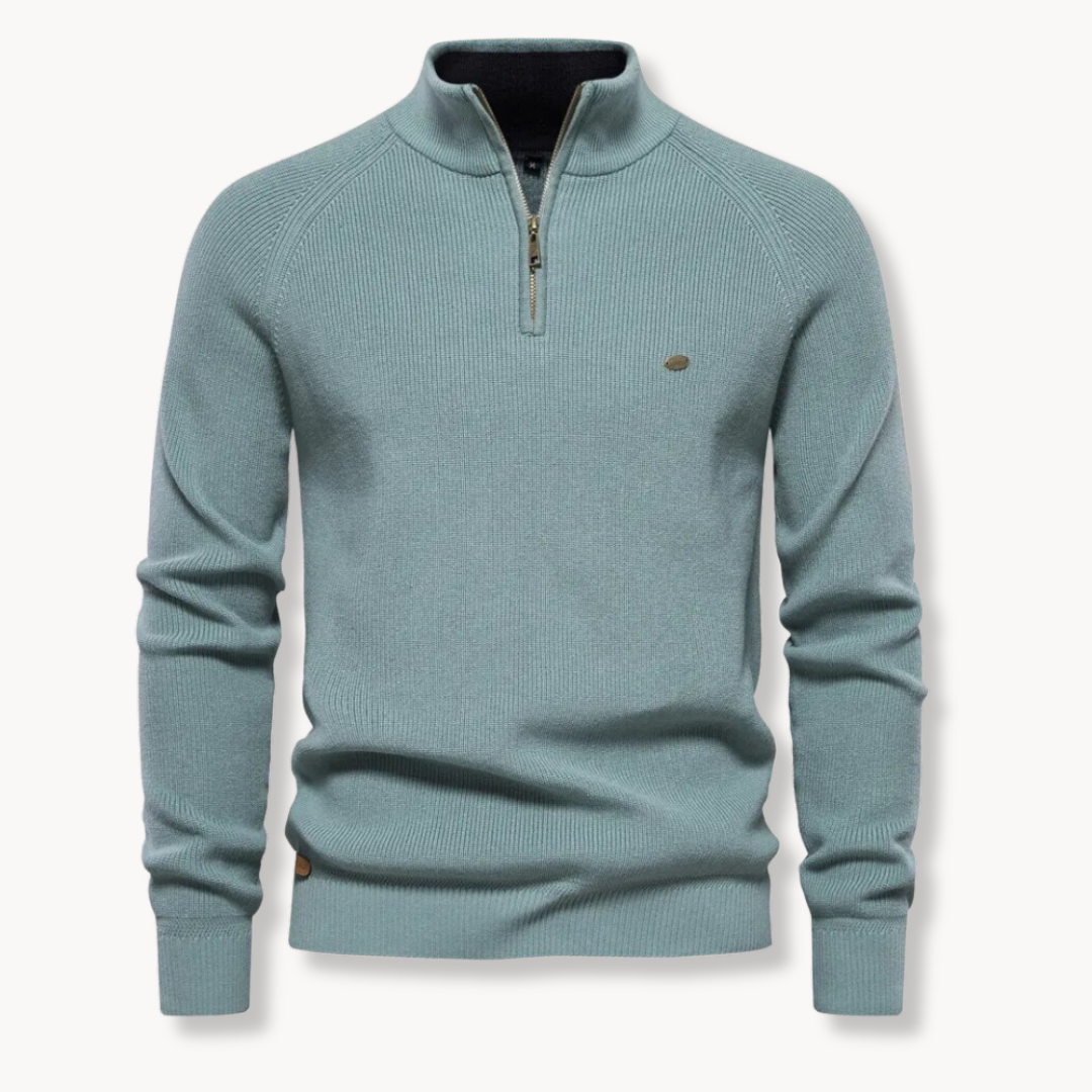 Casual and warm: Men's ribbed knit sweater with a comfortable mock neck and half zip.