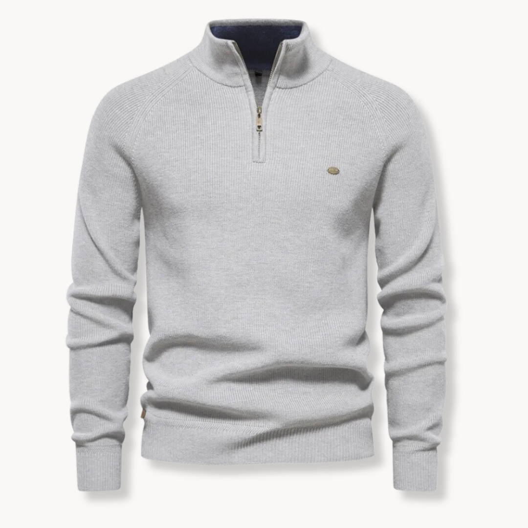 Fashionable men's long sleeve sweater, featuring a ribbed texture and half-zip mock neck.