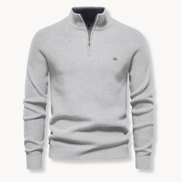 Fashionable men's long sleeve sweater, featuring a ribbed texture and half-zip mock neck.