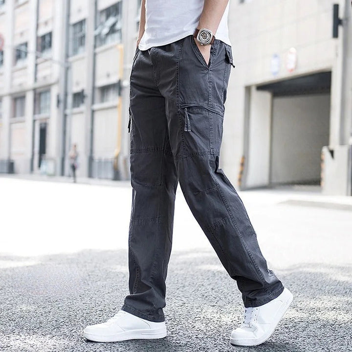 Classic khaki men's Hamilton cargo pants with a relaxed fit and functional pockets for durable everyday utility.