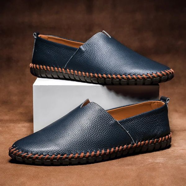 Men's hand-stitched faux leather loafers in brown, offering artisanal comfort and versatile style.