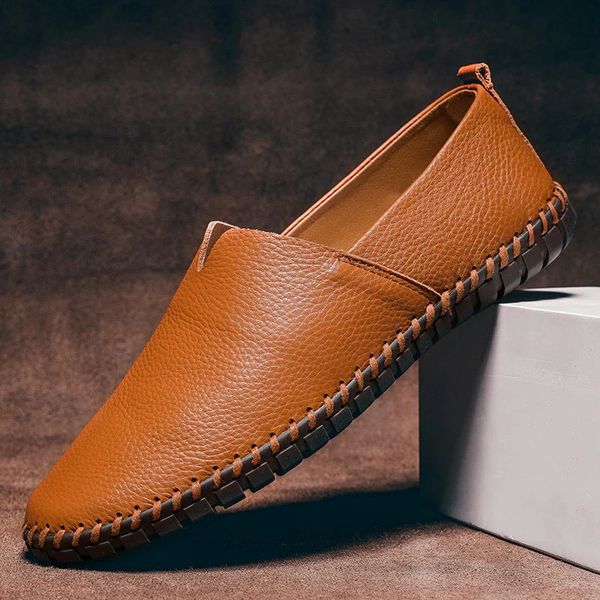 Close-up of Daniel's men's slip-on loafers showcasing detailed hand-stitching on faux leather.