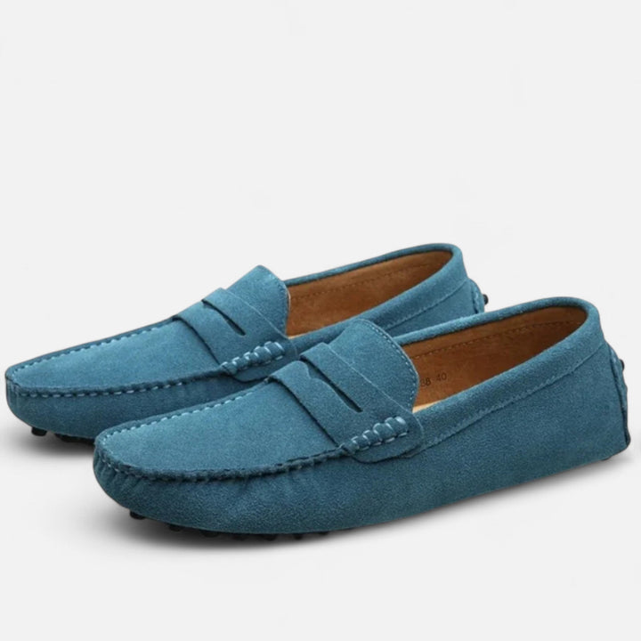 Durable men's handmade loafers in quality leather, offering stylish comfort and a versatile slip-on design.