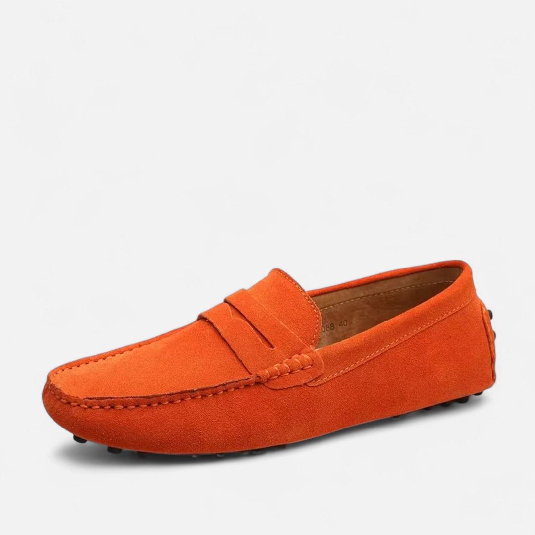 Classic men's handmade leather loafers, providing superior comfort and elegant slip-on convenience.