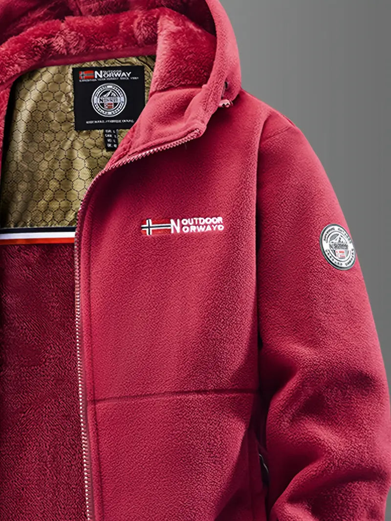 Action shot of a man wearing the men's fleece lined winter jacket outdoors.