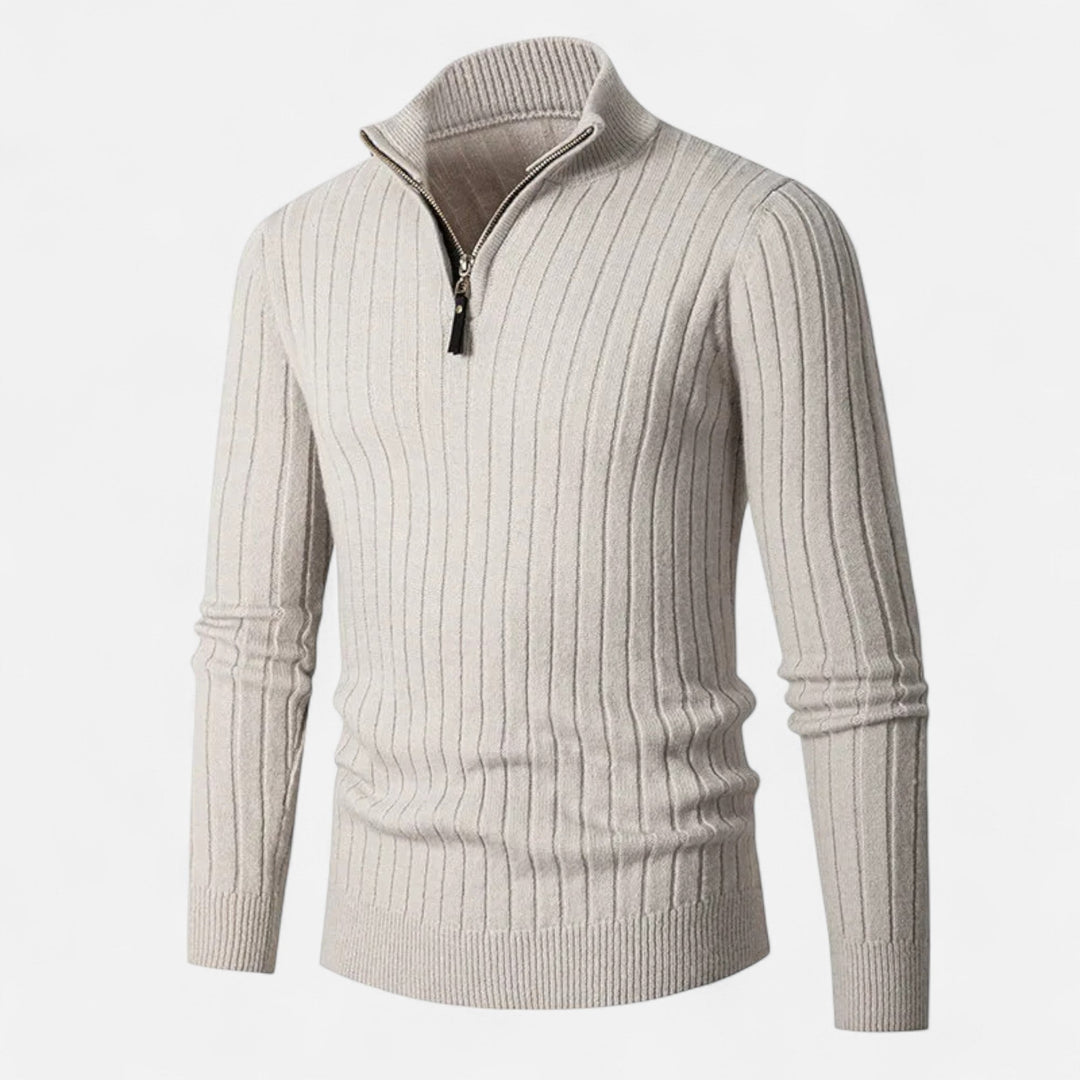 Man wearing a stylish Men's Heritage Half-Zip Knit Sweater with a distinctive vertical bar design.