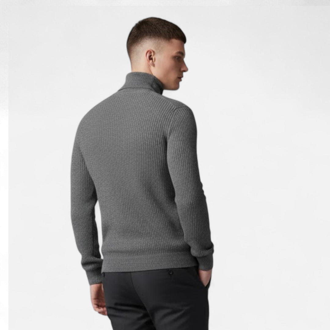 Men's fashionable grey high-lapel oversized pullover sweater, styled for a relaxed and sophisticated autumn look.