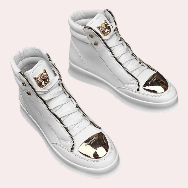 Fashionable men's high-top statement sneakers, featuring a metallic toe for bold streetwear and urban casual looks.