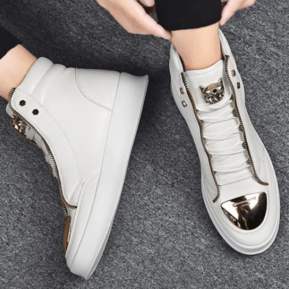 Stylish men's high-top sneakers with a metallic toe and side zip, ideal for streetwear and casual urban fashion.