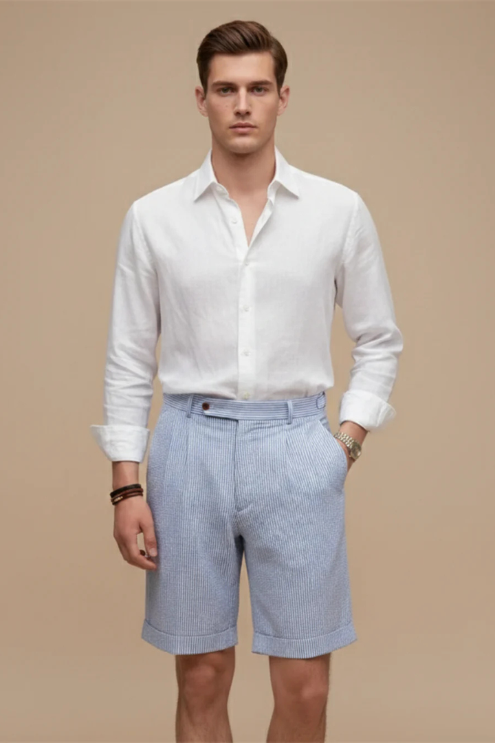 Tailored men's high waist striped chino shorts featuring a smart pleated turn-up hem, ideal for summer.