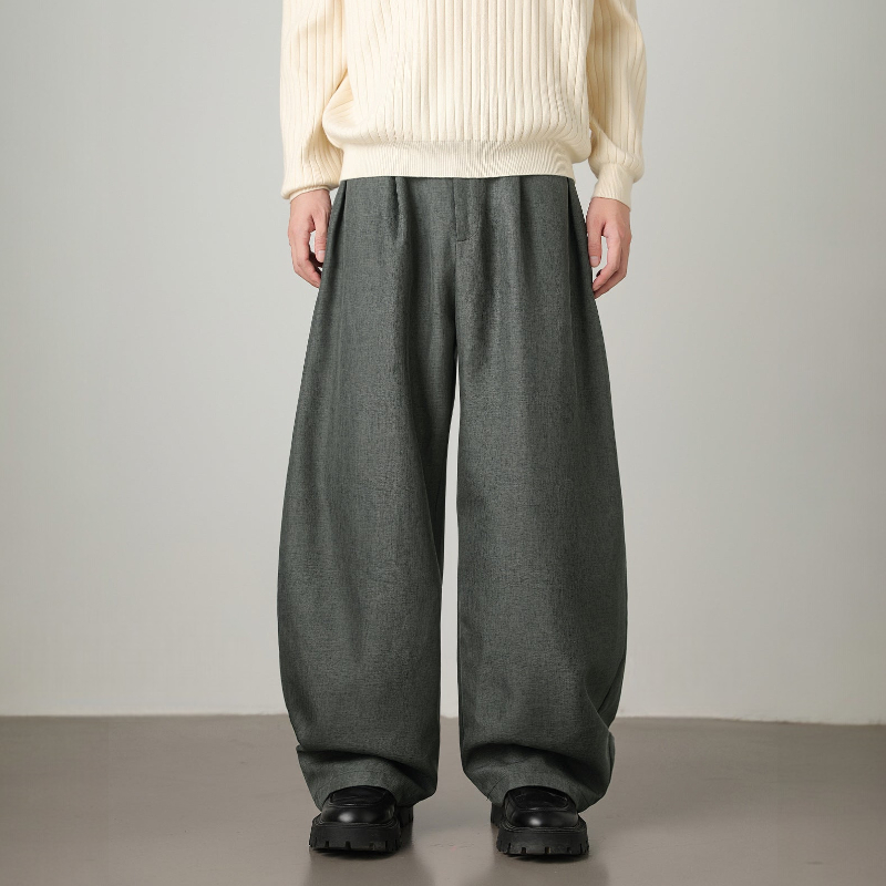 Stylish men's wide leg trousers featuring a high waist, elegant pleats & a functional adjustable belt.