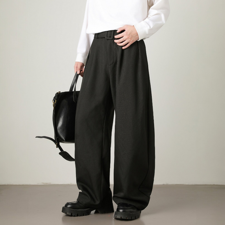 Men's pleated high-waisted wide leg trousers, designed with an adjustable belt for a tailored, relaxed fit.