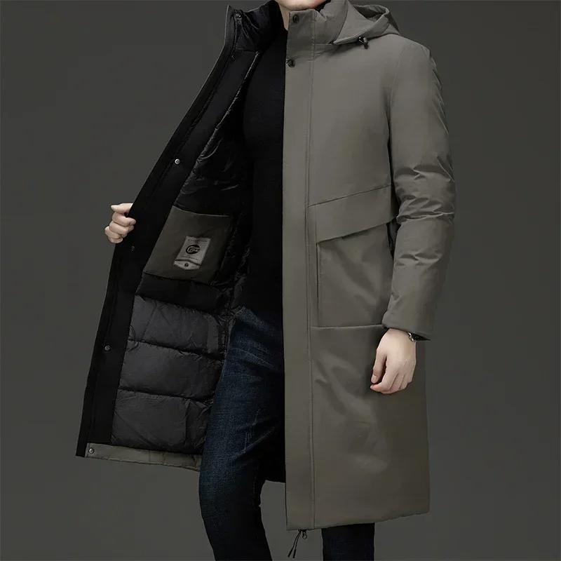 Men's hooded long winter coat. Stylish padded design for warmth in cold weather outerwear.