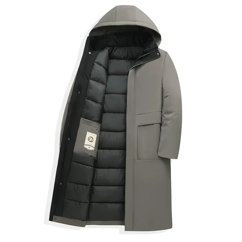 Men's long padded hooded coat with a sleek design. Stay warm and fashionable in this winter jacket.
