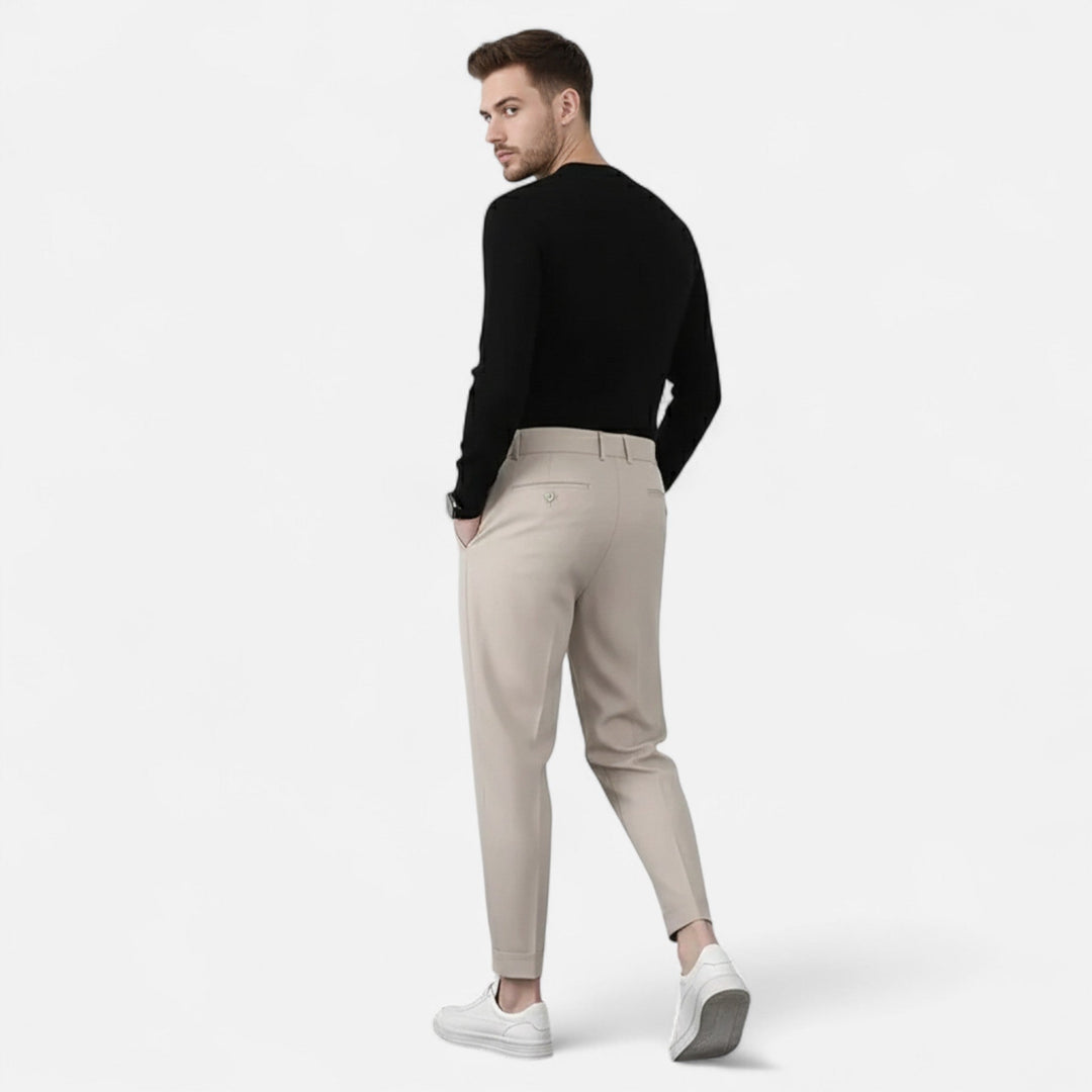 Men's white formal wear trousers, pleated and tapered design