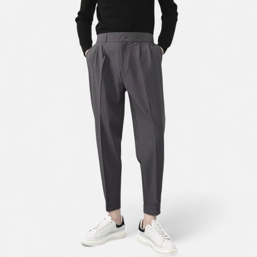Stylish pleated trousers for men, offering a comfortable tapered fit