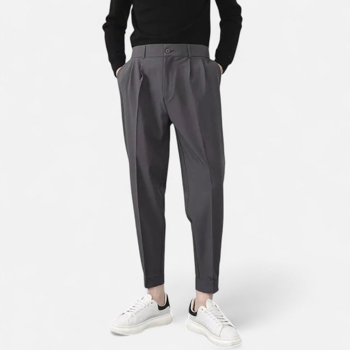 Stylish pleated trousers for men, offering a comfortable tapered fit