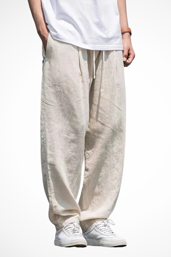 Men's khaki wide leg trousers with elastic waist for a comfortable, relaxed fit. Perfect casual bottoms.